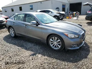 2014 Infiniti Q50 Sport with VIN JN1BV7ARXEM701051, listed as a Copart auction lot 55157825 with 192,418 mi miles and Salvage title. Bid and sale history available at DreamBid. Image 4.
