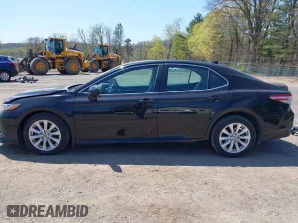 2020 Toyota Camry LE with VIN 4T1C11AK9LU387012, listed as a IAAI auction lot 42103647 with 64,049 mi miles and . Bid and sale history available at carsss.com. Image 15.