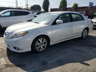 2011 Toyota Avalon with VIN 4T1BK3DBXBU421795, listed as a Copart auction lot 63797645 with 180,873 mi miles and Salvage title. Bid and sale history available at DreamBid. Image 1.