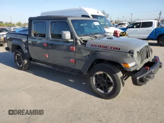 2021 Jeep Gladiator Willys z VIN 1C6HJTAG4ML517715, wystawiony jako Copart lot #52938125 z przebiegiem 21 187 mil mil oraz Szkoda całkowita • Salvage title. Historia ofert i sprzedaży dostępna na DreamBid. Obrazek 4.