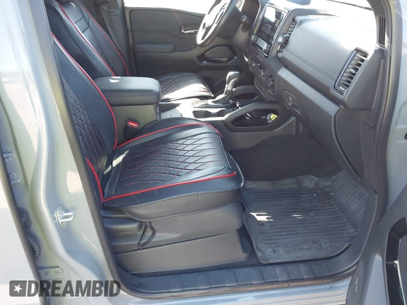 2022 Nissan Frontier SV z VIN 1N6ED1EKXNN659026, wystawiony jako IAAI lot #42050476 z przebiegiem 26 183 mil mil oraz . Historia ofert i sprzedaży dostępna na DreamBid. Obrazek 5.