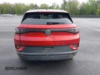 2023 Volkswagen ID.4 Pro S z VIN 1V2FMPE83PC010566, wystawiony jako IAAI lot #42255980 z przebiegiem Nie podano mil oraz . Historia ofert i sprzedaży dostępna na DreamBid. Obrazek 16.