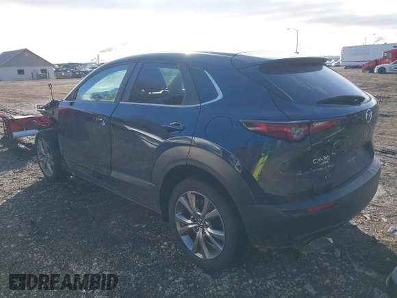 2020 Mazda CX-30 Select with VIN 3MVDMBCL9LM126154, listed as a IAAI auction lot 41492799 with 51,977 mi miles and . Bid and sale history available at DreamBid. Image 3.