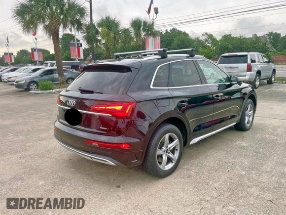 2021 Audi Q5 Premium z VIN WA1AAAFY8M2003513, wystawiony jako Copart lot #59569575 z przebiegiem 87 242 mil mil oraz Czysty tytuł • Clean title. Historia ofert i sprzedaży dostępna na DreamBid. Obrazek 4.