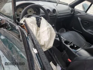 2001 Mazda MX-5 Miata z VIN JM1NB353610200693, wystawiony jako Copart lot #55385725 z przebiegiem 98 777 mil mil oraz Szkoda całkowita • Salvage title. Historia ofert i sprzedaży dostępna na DreamBid. Obrazek 8.