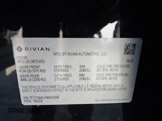 2022 Rivian R1T Launch Edition z VIN 7FCTGAAL1NN010340, wystawiony jako IAAI lot #41656762 z przebiegiem Nie podano mil oraz . Historia ofert i sprzedaży dostępna na DreamBid. Obrazek 9.