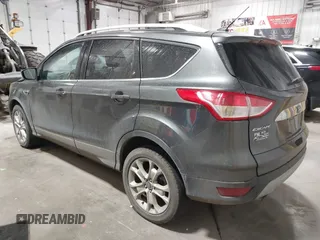 2016 Ford Escape Titanium with VIN 1FMCU9J93GUC39933, listed as a IAAI auction lot 42616323 with 116,482 mi miles and . Bid and sale history available at DreamBid. Image 3.