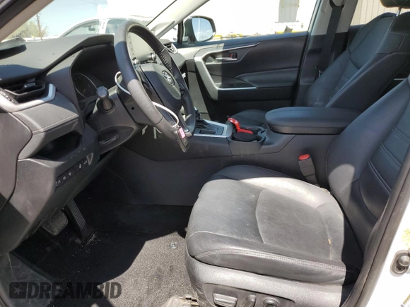 2021 Toyota RAV4 XLE Premium with VIN 2T3C1RFV0MW153089, listed as a Copart auction lot 60759615 with 28,153 mi miles and Salvage title. Bid and sale history available at DreamBid. Image 7.