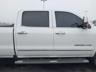 2015 GMC Sierra 2500HD Denali with VIN 1GT120E85FF681680, listed as a IAAI auction lot 42081711 with 67,676 mi miles and . Bid and sale history available at DreamBid. Image 13.
