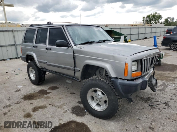2001 Jeep Cherokee Sport with VIN 1J4FF48S91L592966, listed as a Copart auction lot 58996445 with 159,140 mi miles and Salvage title. Bid and sale history available at DreamBid. Image 4.