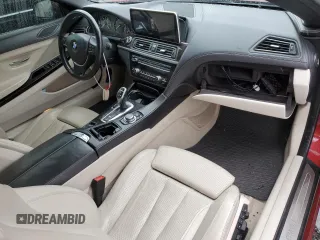 2012 BMW 6 Series 650i z VIN WBALZ3C58CDL70716, wystawiony jako Copart lot #43794155 z przebiegiem 69 745 mil mil oraz Szkoda całkowita • Salvage title. Historia ofert i sprzedaży dostępna na DreamBid. Obrazek 8.