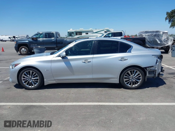 2018 Infiniti Q50 Luxe with VIN JN1EV7AP6JM352203, listed as a IAAI auction lot 42708336 with 79,994 mi miles and . Bid and sale history available at DreamBid. Image 15.