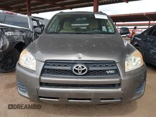 2009 Toyota RAV4 with VIN JTMBK33V895074715, listed as a IAAI auction lot 41802446 with 215,892 mi miles. Bid and sale history available at carsss.com. Image 6.