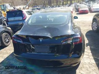 2023 Tesla Model 3 with VIN 5YJ3E1EA2PF482536, listed as a IAAI auction lot 41858110 with 6,298 mi miles. Bid and sale history available at carsss.com. Image 16.
