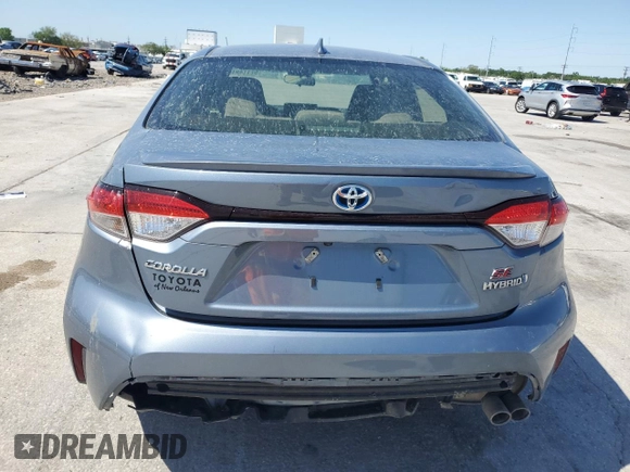 2023 Toyota Corolla Hybrid LE with VIN JTDBCMFE6P3015167, listed as a Copart auction lot 52114915 with 35,334 mi miles and Salvage Title. Bid and sale history available at carsss.com. Image 6.