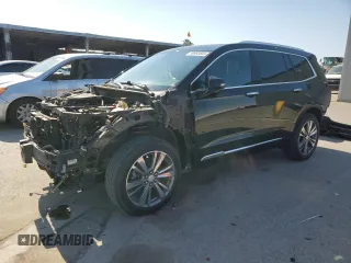 2021 Cadillac XT6 Premium Luxury with VIN 1GYKPDRS4MZ175962, listed as a Copart auction lot 59993565 with 97,157 mi miles and Salvage title. Bid and sale history available at DreamBid. Image 1.