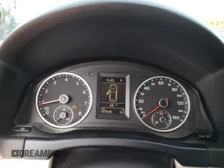 2012 Volkswagen Tiguan SE z VIN WVGAV7AXXCW005665, wystawiony jako Copart lot #58413145 z przebiegiem 197 505 mil mil oraz Tytuł czysty. Historia ofert i sprzedaży dostępna na DreamBid. Obrazek 9.