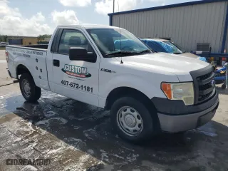 2014 Ford F-150 XL with VIN 1FTMF1CM7EKF39988, listed as a Copart auction lot 51571215 with 129,199 mi miles and Salvage Title. Bid and sale history available at carsss.com. Image 4.