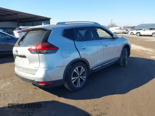 2017 Nissan Rogue SL with VIN JN8AT2MT0HW380062, listed as a IAAI auction lot 41327848 with Not Provided miles and . Bid and sale history available at DreamBid. Image 4.