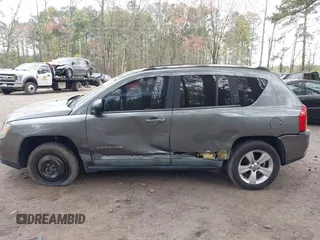 2011 Jeep Compass Latitude with VIN 1J4NF1FB5BD264825, listed as a IAAI auction lot 41935691 with 166,184 mi miles. Bid and sale history available at carsss.com. Image 14.