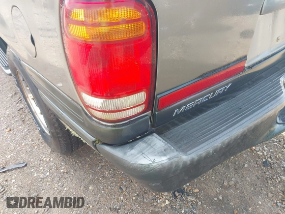 1999 Mercury Mountaineer with VIN 4M2ZU52E1XUJ26317, listed as a IAAI auction lot 42606083 with 126,554 mi miles and . Bid and sale history available at DreamBid. Image 6.