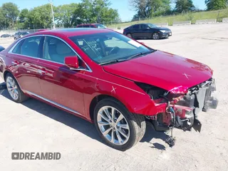 2014 Cadillac XTS Luxury with VIN 2G61M5S39E9143218, listed as a IAAI auction lot 42601268 with 37,172 mi miles and . Bid and sale history available at DreamBid. Image 1.