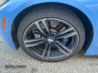 2015 BMW M4 with VIN WBS3U9C56FP967640, listed as a Copart auction lot 63641785 with 31,516 mi miles and Salvage title. Bid and sale history available at DreamBid. Image 11.