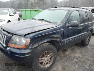 2004 Jeep Grand Cherokee Laredo with VIN 1J4GW48N04C220886, listed as a IAAI auction lot 41473522 with 146,156 mi miles. Bid and sale history available at carsss.com. Image 2.