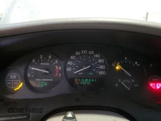 1999 Buick Regal LS with VIN 2G4WB52K3X1470162, listed as a Copart auction lot 79957944 with 153,249 mi miles and Salvage Title. Bid and sale history available at carsss.com. Image 9.