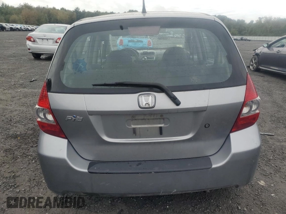2007 Honda Fit with VIN JHMGD38417S025157, listed as a Copart auction lot 72768984 with 128,944 mi miles and Clean Title. Bid and sale history available at carsss.com. Image 6.
