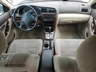 2003 Subaru Legacy Outback z VIN 4S3BH665937644454, wystawiony jako Copart lot #57404695 z przebiegiem 242 345 mil mil oraz Szkoda całkowita • Salvage title. Historia ofert i sprzedaży dostępna na DreamBid. Obrazek 8.