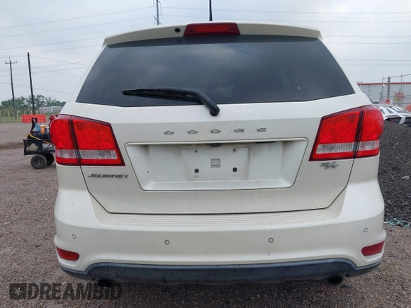 2013 Dodge Journey R/T with VIN 3C4PDCEG5DT642751, listed as a IAAI auction lot 42306951 with 129,338 mi miles and . Bid and sale history available at DreamBid. Image 16.