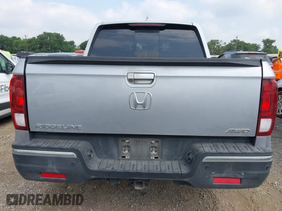 2019 Honda Ridgeline RTL-E with VIN 5FPYK3F73KB006244, listed as a IAAI auction lot 42167460 with 53,498 mi miles and . Bid and sale history available at DreamBid. Image 17.
