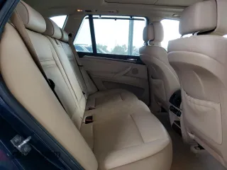 2012 BMW X5 35i z VIN 5UXZV4C58CL756913, wystawiony jako Copart lot #51746195 z przebiegiem 160 295 mil mil oraz Szkoda całkowita • Salvage title. Historia ofert i sprzedaży dostępna na DreamBid. Obrazek 11.