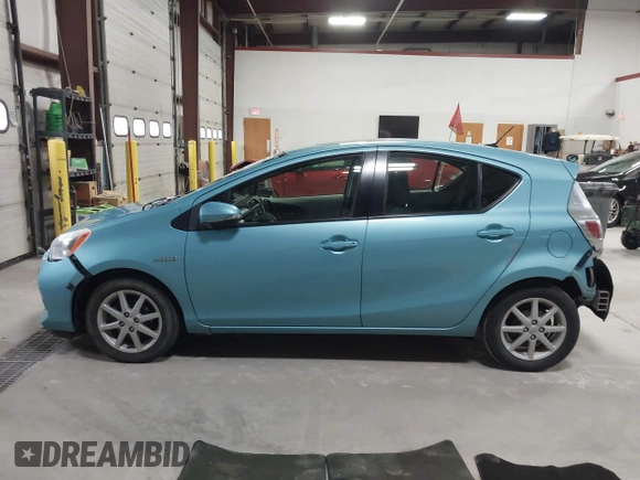 2014 Toyota Prius One z VIN JTDKDTB3XE1060360, wystawiony jako IAAI lot #41972531 z przebiegiem 140 012 mil mil oraz . Historia ofert i sprzedaży dostępna na DreamBid. Obrazek 14.