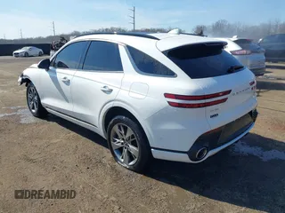 2022 Genesis GV70 Sport z VIN KMUMCDTC4NU039497, wystawiony jako IAAI lot #41668778 z przebiegiem 31 545 mil mil oraz . Historia ofert i sprzedaży dostępna na DreamBid. Obrazek 3.