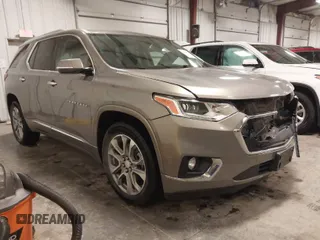 2018 Chevrolet Traverse Premier with VIN 1GNEVJKW0JJ165144, listed as a IAAI auction lot 41129951 with 137,593 mi miles. Bid and sale history available at carsss.com. Image 1.