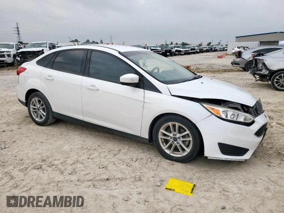 2018 Ford Focus SE with VIN 1FADP3F23JL246375, listed as a Copart auction lot 56539005 with 83,130 mi miles and Salvage title. Bid and sale history available at DreamBid. Image 4.