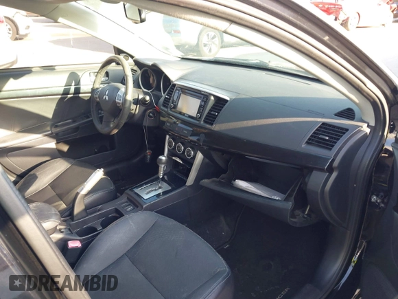 2017 Mitsubishi Lancer ES with VIN JA32V2FWXHU000916, listed as a IAAI auction lot 41727166 with 85,182 mi miles. Bid and sale history available at carsss.com. Image 5.