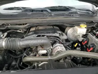 2020 Ram 1500 Lone Star z VIN 1C6RREFTXLN152622, wystawiony jako Copart lot #70911045 z przebiegiem 105 423 mil mil oraz Szkoda całkowita • Salvage title. Historia ofert i sprzedaży dostępna na DreamBid. Obrazek 13.