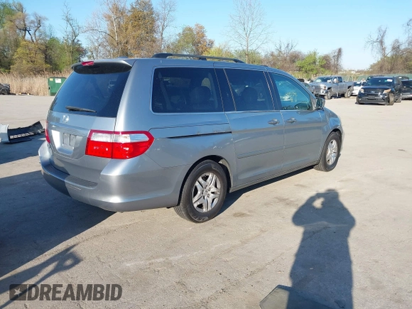 2007 Honda Odyssey EX-L with VIN 5FNRL387X7B140294, listed as a IAAI auction lot 41995795 with 202,934 mi miles. Bid and sale history available at carsss.com. Image 4.