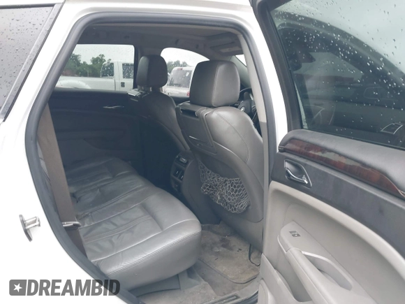 2010 Cadillac SRX Premium Collection z VIN 3GYFNCEY4AS569787, wystawiony jako IAAI lot #42524167 z przebiegiem 222 000 mil mil oraz . Historia ofert i sprzedaży dostępna na DreamBid. Obrazek 8.