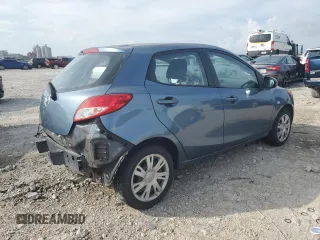 2014 Mazda 2 Sport z VIN JM1DE1KY0E0177473, wystawiony jako Copart lot #60984055 z przebiegiem 88 202 mil mil oraz Szkoda całkowita • Salvage title. Historia ofert i sprzedaży dostępna na DreamBid. Obrazek 3.