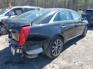 2014 Cadillac XTS with VIN 2G61L5S38E9202763, listed as a IAAI auction lot 41820564 with 117,709 mi miles. Bid and sale history available at carsss.com. Image 4.