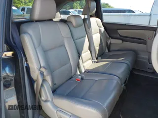 2011 Honda Odyssey EX-L with VIN 5FNRL5H6XBB073482, listed as a IAAI auction lot 42090463 with 213,061 mi miles and . Bid and sale history available at carsss.com. Image 8.