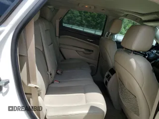 2014 Cadillac SRX Luxury Collection z VIN 3GYFNBE30ES685072, wystawiony jako Copart lot #58122705 z przebiegiem 128 013 mil mil oraz Szkoda całkowita • Salvage title. Historia ofert i sprzedaży dostępna na DreamBid. Obrazek 11.