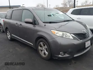 2013 Toyota Sienna LE AAS with VIN 5TDKK3DC3DS320134, listed as a IAAI auction lot 41889459 with 150,741 mi miles. Bid and sale history available at carsss.com. Image 1.