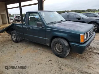 1993 Mitsubishi Mighty Max z VIN JA7LS21G6PP003529, wystawiony jako Copart lot #81342224 z przebiegiem 313 363 mil mil oraz Szkody całkowita. Historia ofert i sprzedaży dostępna na DreamBid. Obrazek 4.