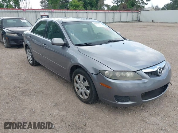 2006 Mazda 6 i with VIN 1YVFP80CX65M36617, listed as a IAAI auction lot 42059906 with 189,192 mi miles. Bid and sale history available at carsss.com. Image 1.