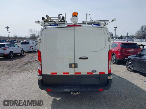 2016 Ford Transit Cargo z VIN 1FTYR1YM1GKB55452, wystawiony jako IAAI lot #41850416 z przebiegiem 91 973 mil mil oraz . Historia ofert i sprzedaży dostępna na DreamBid. Obrazek 16.